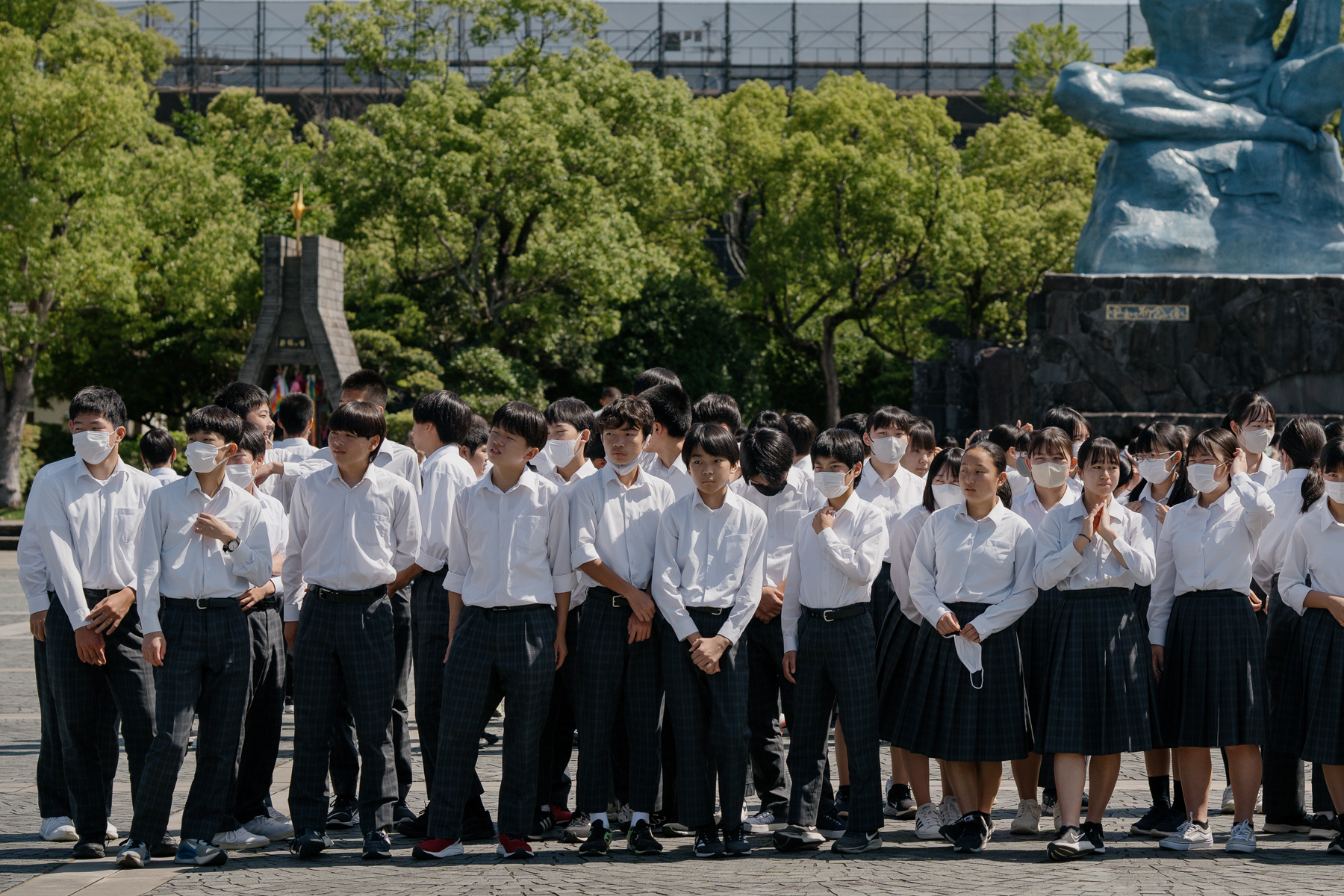 <span style="color: rgb(0, 0, 0);">Students in uniform on a school trip in Nagasaki.</span>