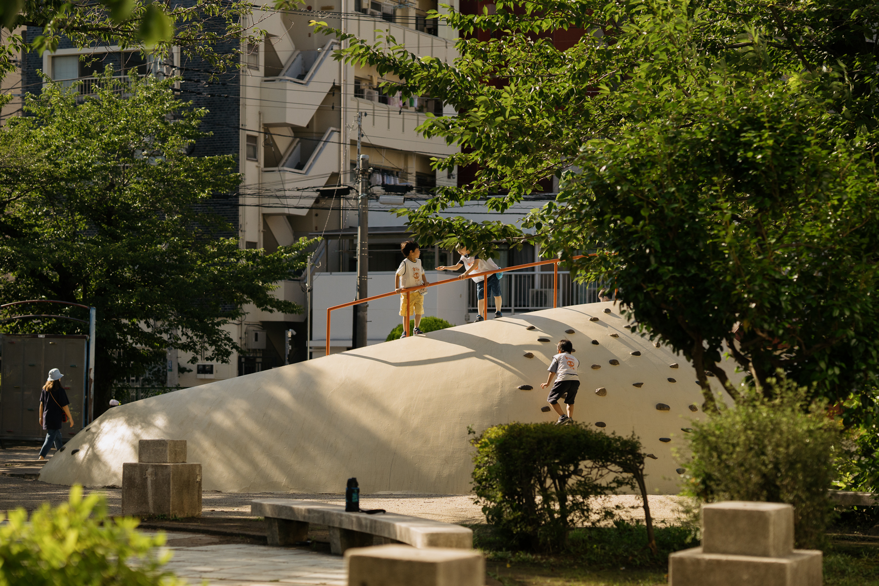 <span style="color: rgb(0, 0, 0);">Children playing in a local playground.</span>