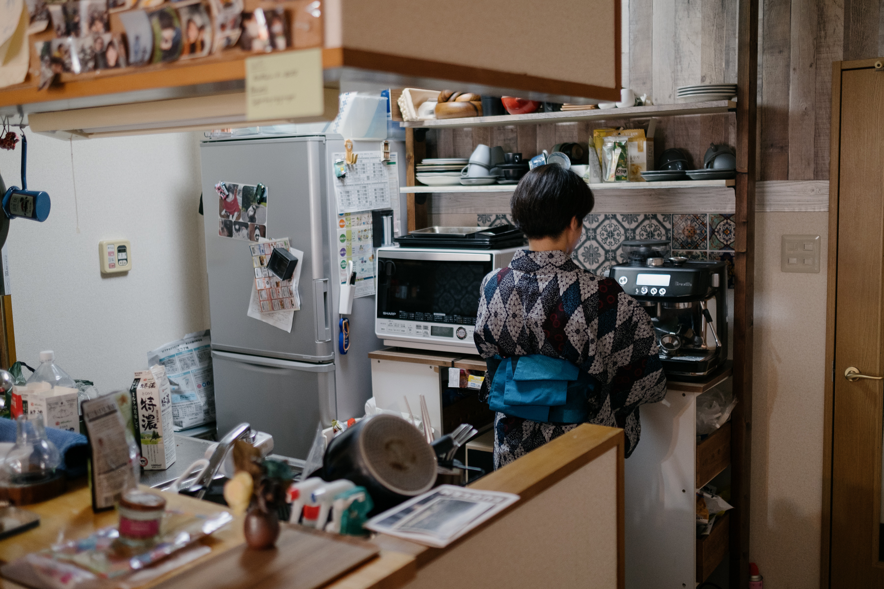 <span style="color: rgb(0, 0, 0);">A missionary in Hiroshima preparing coffee for the guests in her </span><em style="color: rgb(0, 0, 0);">kimono </em><span style="color: rgb(0, 0, 0);">club.</span>
